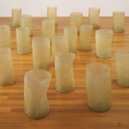 Eva Hesse, Repetition Nineteen III, 1968, fiberglass and polyester resin, nineteen units, Each 19 to 20 1/4" x 11 to 12 3/4" in diameter, MoMA, New York.
