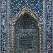Mihrab (prayer niche), Iran, Isfahan, Ilkhanid period (1206–1353), mosaic of polychrome–glazed cut tiles on stonepaste body; set into mortar; 135 1/16 x 113 11/16 in., The Metropolitan Museum of Art, New York, Photo via The Metropolitan Museum of Art.