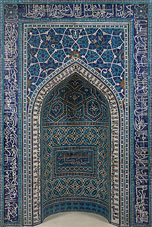 Mihrab (prayer niche), Iran, Isfahan, Ilkhanid period (1206–1353), mosaic of polychrome–glazed cut tiles on stonepaste body; set into mortar; 135 1/16 x 113 11/16 in., The Metropolitan Museum of Art, New York, Photo via The Metropolitan Museum of Art.