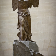 Nike of Samothrace, c. 200-190 BCE, Parian Marble, 96" high, Louvre Museum, Paris, Photo by jimmyweee via Wikimedia Commons, uploaded by russavia, CC BY 2.0.