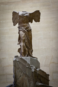 Nike of Samothrace, c. 200-190 BCE, Parian Marble, 96" high, Louvre Museum, Paris, Photo by jimmyweee via Wikimedia Commons, uploaded by russavia, CC BY 2.0.