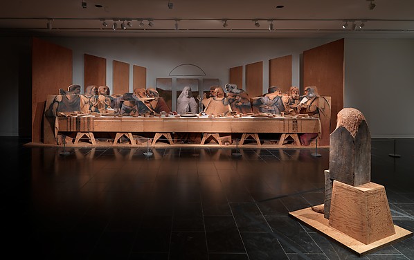 Marisol, Self-Portrait Looking at the Last Supper, 1982-4, Wood, plywood, stone, plaster, aluminum, dye, charcoal, 121 ½” x 358” x 61”, Metropolitan Museum of Art, New York, Photo via the Metropolitan Museum of Art.