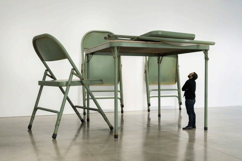 Robert Therrien, Untitled (Folding Chairs and Table), 2008, Paint and metal, Table: 96” x 120” x 120”, Chairs: 104” x 64” x 72”, Image via Artsy.com.